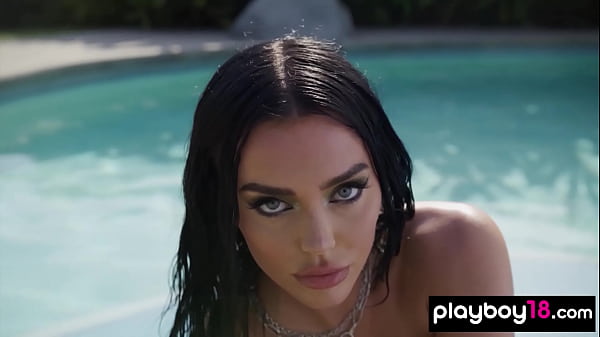 Big boobed brunette naked babe Kaitlynn Anderson posing in the pool outdoor